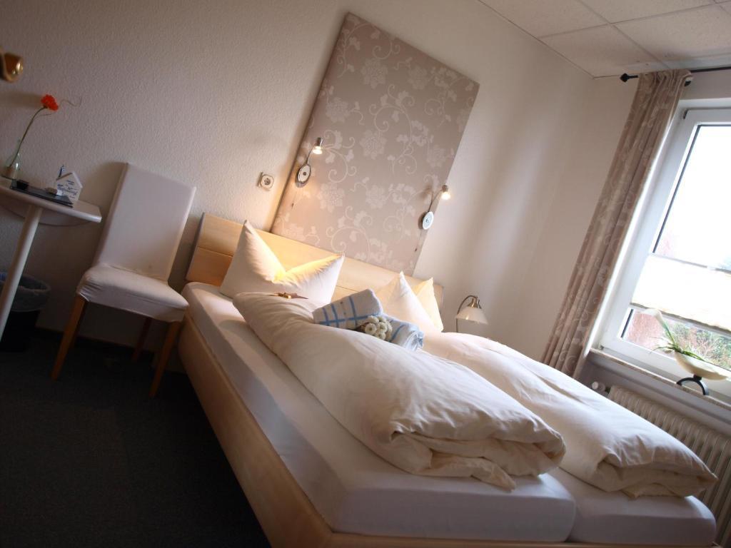 Hotel Ostfriesland Garni Норден Номер фото